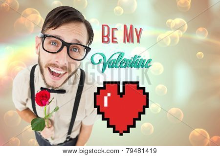 Geeky lovesick hipster holding rose against light dots abstract design