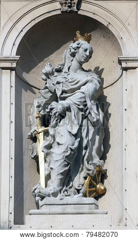 VIENNA, AUSTRIA - OCTOBER 10: Saint Catherine of Alexandria on baroque Jesuits church. The church was built between 1623 and 1627. in Vienna, Austria on October 10, 2014.