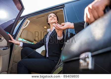 Businesswoman In The Car