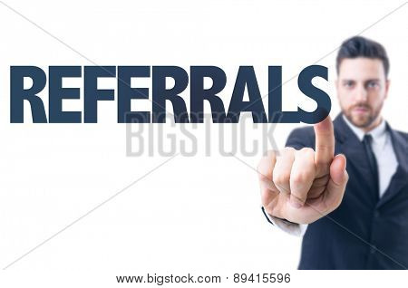 Business man pointing the text: Referrals