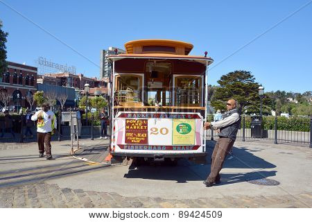 Passengers enjoy a ride in a cable car