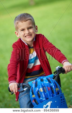 Young boy on the bicycle at Park