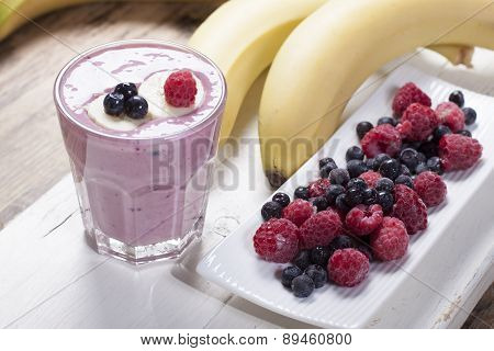 Smoothies Of Frozen Raspberries, Blueberries And Banana With Yogurt.