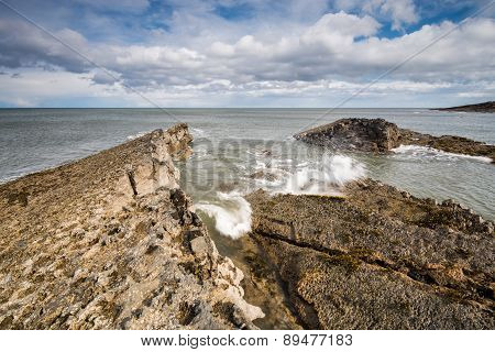 Sea Meets Rocks At Howick