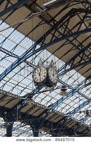 April 2015 - Brighton, England: Train station At Brighton Looking Up The Roof And Clock