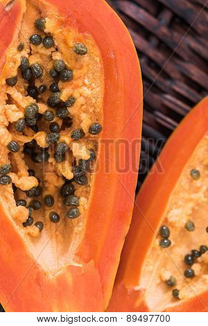 Two slices of papaya