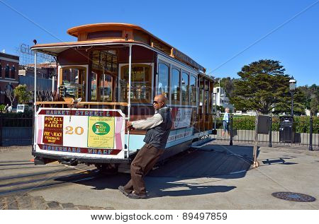 Passengers enjoy a ride in a cable car