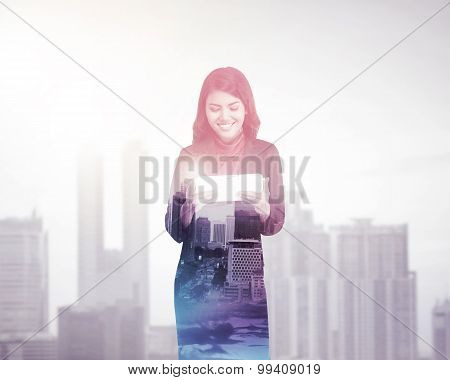 Business Woman With Multiple Exposure Holding Tablet Computer