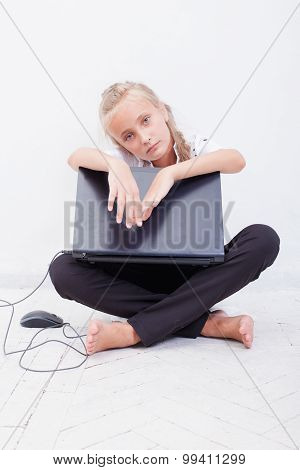 young teen girl with laptop