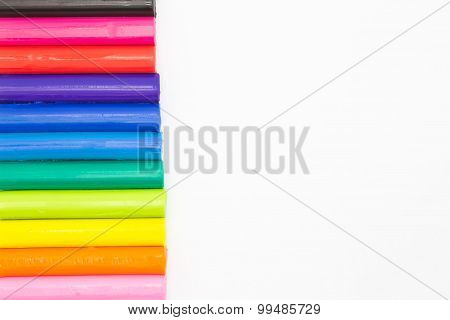 Clay stickes with rainbow colours for children playing