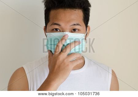 Asian Man Wearing A Face Mask