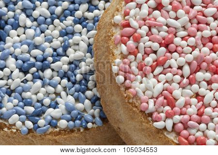'Beschuit met muisjes, a traditional treat to celebrate the birth of a child in The Netherlands. Pink  sprinkles for a girl, blue for a boy