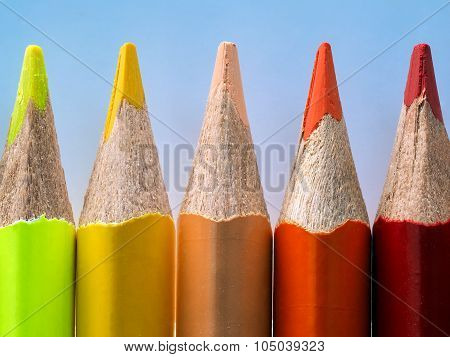 Yellow, orange and red pencil