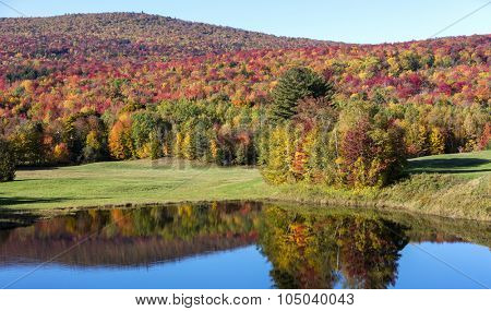 Stunning fall foliage and lake in Vermont, USA