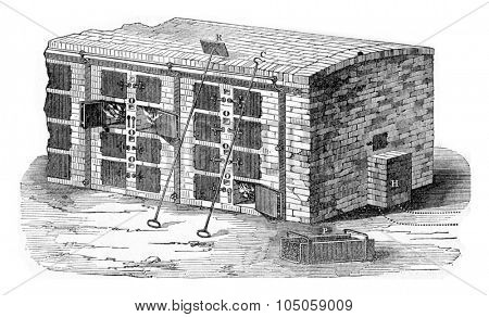 Muffle furnace for baking molds coals, vintage engraved illustration. Industrial encyclopedia E.-O. Lami - 1875.
