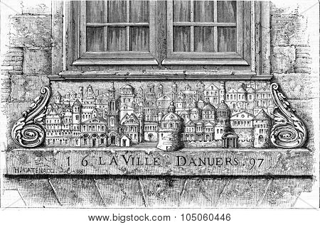 Bas-relief of a house in Dieppe representing the city of Antwerp, vintage engraved illustration. Magasin Pittoresque (1882).
