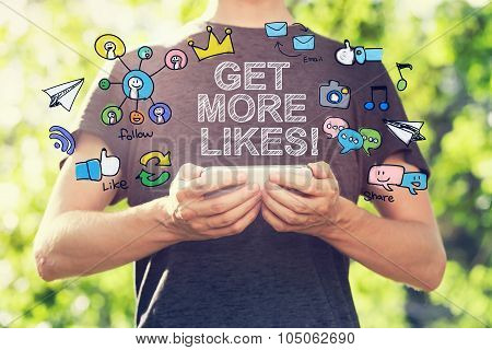 Get More Likes Concept With Young Man Holding His Smartphone