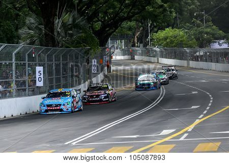 KUALA LUMPUR, MALAYSIA - AUGUST 08, 2015: Turbo charged V8 supercars take part in the V8 Supercars Street Challenge at the 2015 Kuala Lumpur City Grand Prix.