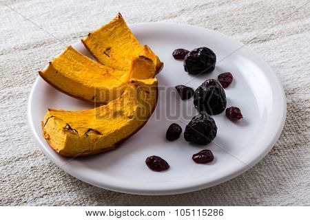 Baked Pumpkin On White Plate