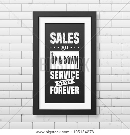 Quote typographical Background in realistic square black frame on the brick wall background