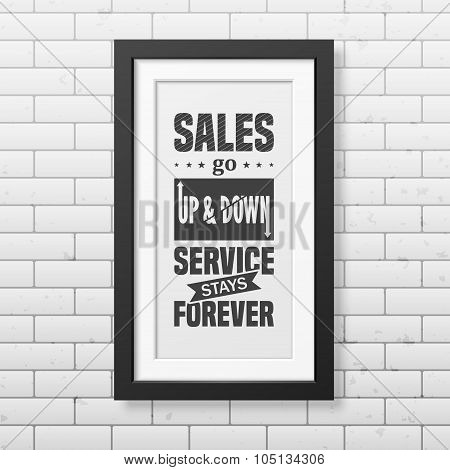 Quote typographical Background in realistic square black frame on the brick wall background