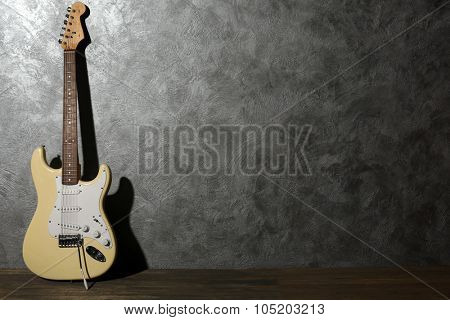 Guitar on grey background