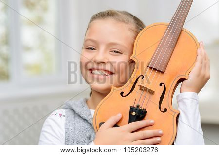 Nice girl playing the violin