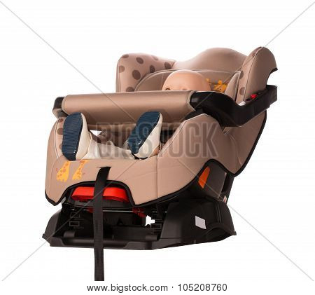 Baby doll in a booster seat for a car