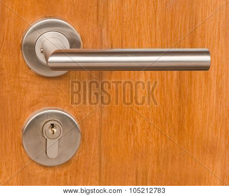 Lock And Door Handle On Wooden Door