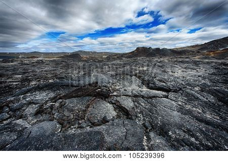 Inhospitable dramatic volcanic landscape at Krafla geothermal area, Iceland