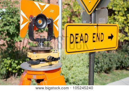 Deflector and sign Dead end near road at sunny day.
