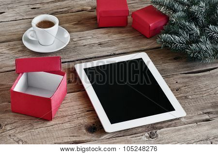 White Tablet Computer With Open Christmas Gifts