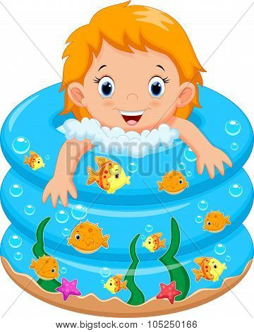 Baby girl bath in a bathtub with lot of soap