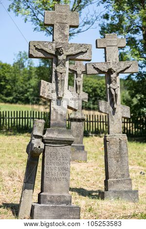 Old abandoned stony Orthodox crosses  in Regietow. Poland