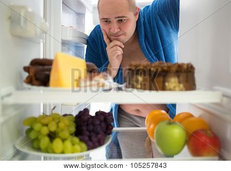 Corpulent man wish hard food rather than healthy food
