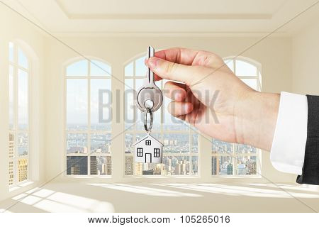 Hand Giving Keys To New Apartments