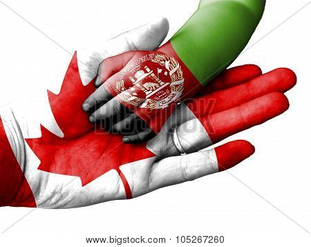 Adult Man Holding A Baby Hand With Canada And Afghanistan Flags Overlaid. Isolated On White