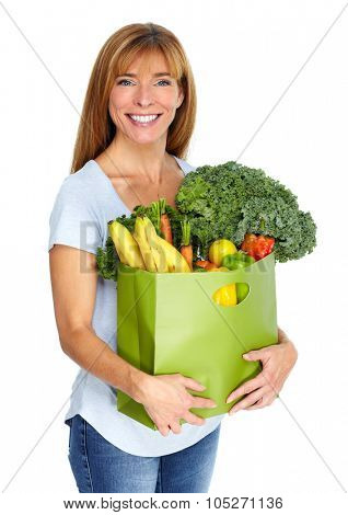 Woman with grocery bag of vegetables isilated white background.