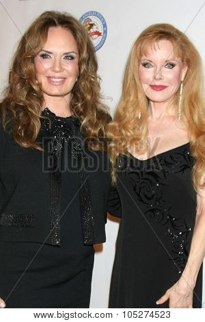LOS ANGELES - OCT 17:  Catherine Bach, Rebecca Holden at the  LAPD Eagle & Badge Foundation Gala at the Century Plaza Hotel on October 17, 2015 in Century City, CA