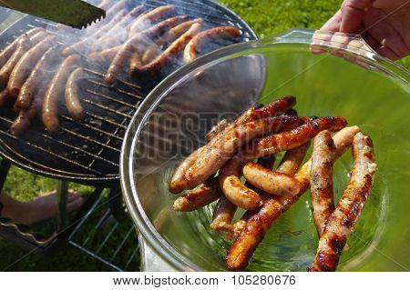 Grilling Sausages.
