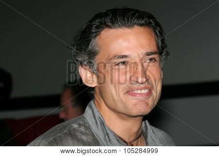 ROME - OCTOBER 16: Actor Enrico Lo Verso attends a photocall to promote the movie 'Alatriste' on the fourth day of Rome Film Festival (Festa Internazionale di Roma) on October 16, 2006 in Rome, Italy