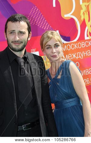 MOSCOW - JUNE 26: Emmanuelle Beart and Michael Cohen attend the closing ceremony of 32nd Moscow Film Festival on June 26, 2010 in Moscow, Russia
