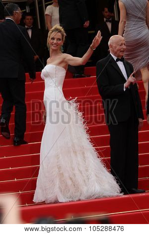 CANNES, FRANCE - MAY 11: Actress  Uma Thurman attends the Opening Ceremony and 'Midnight In Paris' Premiere at the Palais des Festivals during the 64 Cannes Festival on May 11, 2011 in Cannes, France