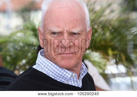 CANNES, FRANCE - MAY 20: Actor Malcolm McDowell attends the 'Le Lechon De Cinema: Malcom McDowell' photocall during the 64 Cannes  Festival at Palais des Festivals on May 20, 2011 in Cannes, France.