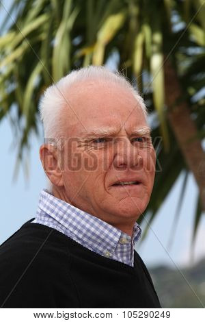 CANNES, FRANCE - MAY 20: Actor Malcolm McDowell attends the 'Le Lechon De Cinema: Malcom McDowell' photocall during the 64 Cannes  Festival at Palais des Festivals on May 20, 2011 in Cannes, France.