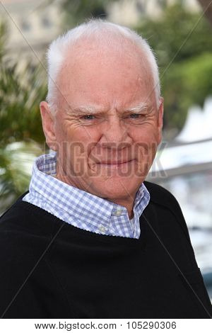 CANNES, FRANCE - MAY 20: Actor Malcolm McDowell attends the 'Le Lechon De Cinema: Malcom McDowell' photocall during the 64 Cannes  Festival at Palais des Festivals on May 20, 2011 in Cannes, France.