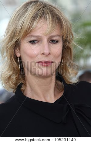 CANNES, FRANCE - MAY 13: Actress Karin Viard  attends the 'Polisse' photocall at the Palais Des Festivals during the 64th Cannes Film Festival on May 13, 2011 in Cannes, France