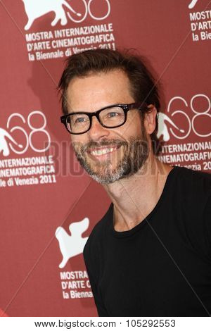 VENICE, ITALY - SEPTEMBER 02: Actor Guy Pearce poses at the 'Mildred Pierce' photocall at the Palazzo del Cinema during the 68th Venice Film Festival on September 2, 2011 in Venice, Italy.
