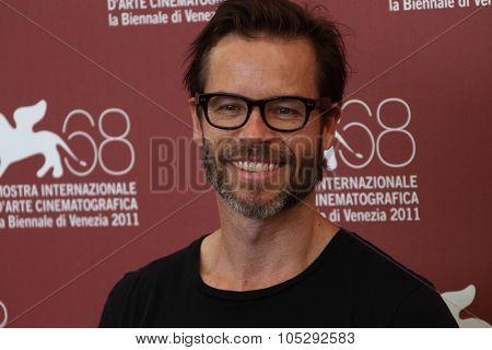 VENICE, ITALY - SEPTEMBER 02: Actor Guy Pearce poses at the 'Mildred Pierce' photocall at the Palazzo del Cinema during the 68th Venice Film Festival on September 2, 2011 in Venice, Italy.