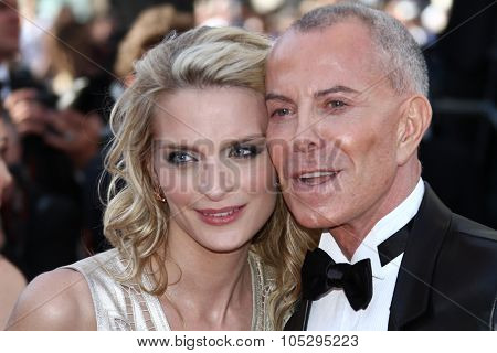CANNES, FRANCE - MAY 16: Sarah Marshall and Jean-Claude Jitrois arrive at Electrolux at Opening Night of The 65th Annual Cannes Festival at the Palais des Festivals on May 16, 2012 in Cannes, France.